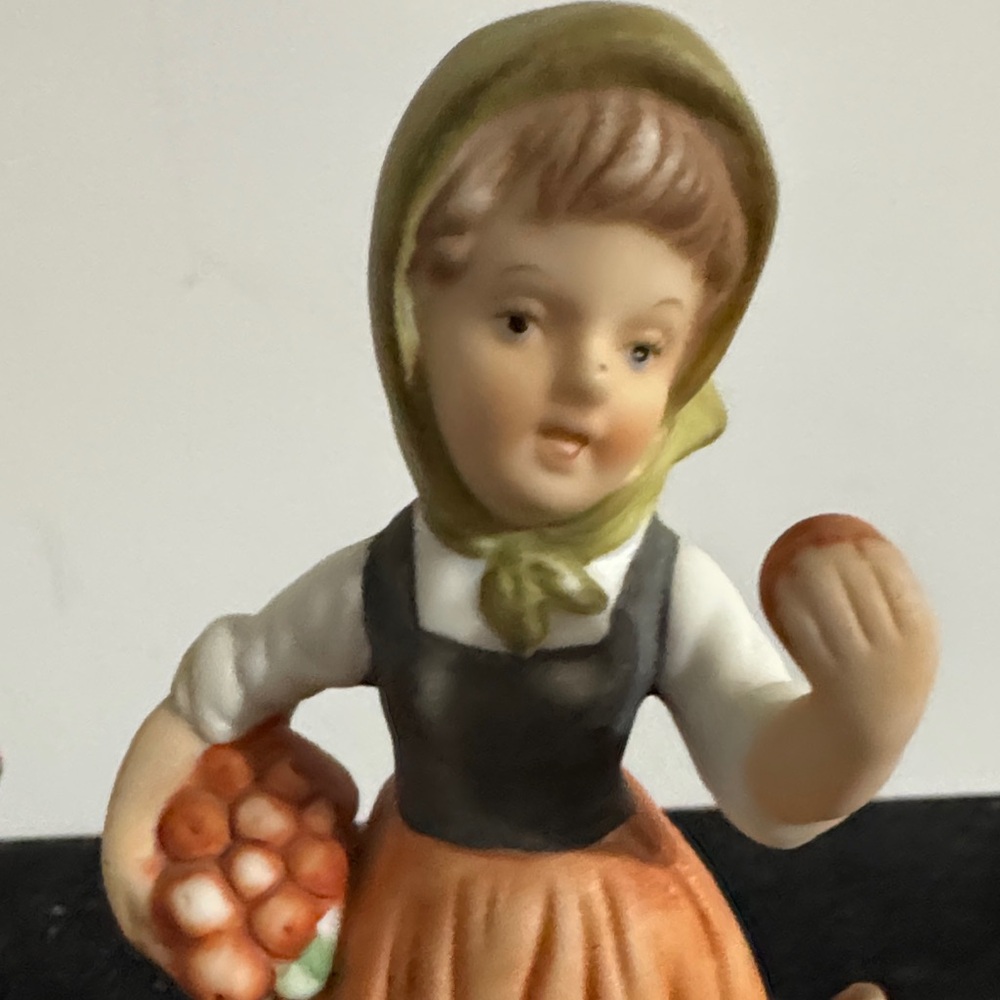 vintage hand-painted porcelain figurines of a boy and girl carrying baskets. - Picture 10 of 16